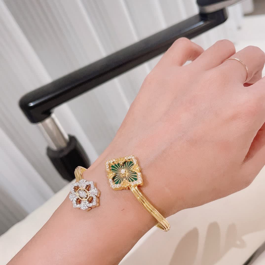 Van Cleef & Arpels Elegant Gold Plated Bracelets with Enamel and Diamond Accents